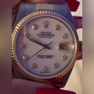 Rolex Datejust 36mm steel & 14k gold jubilee band; pearl face & diamonds.